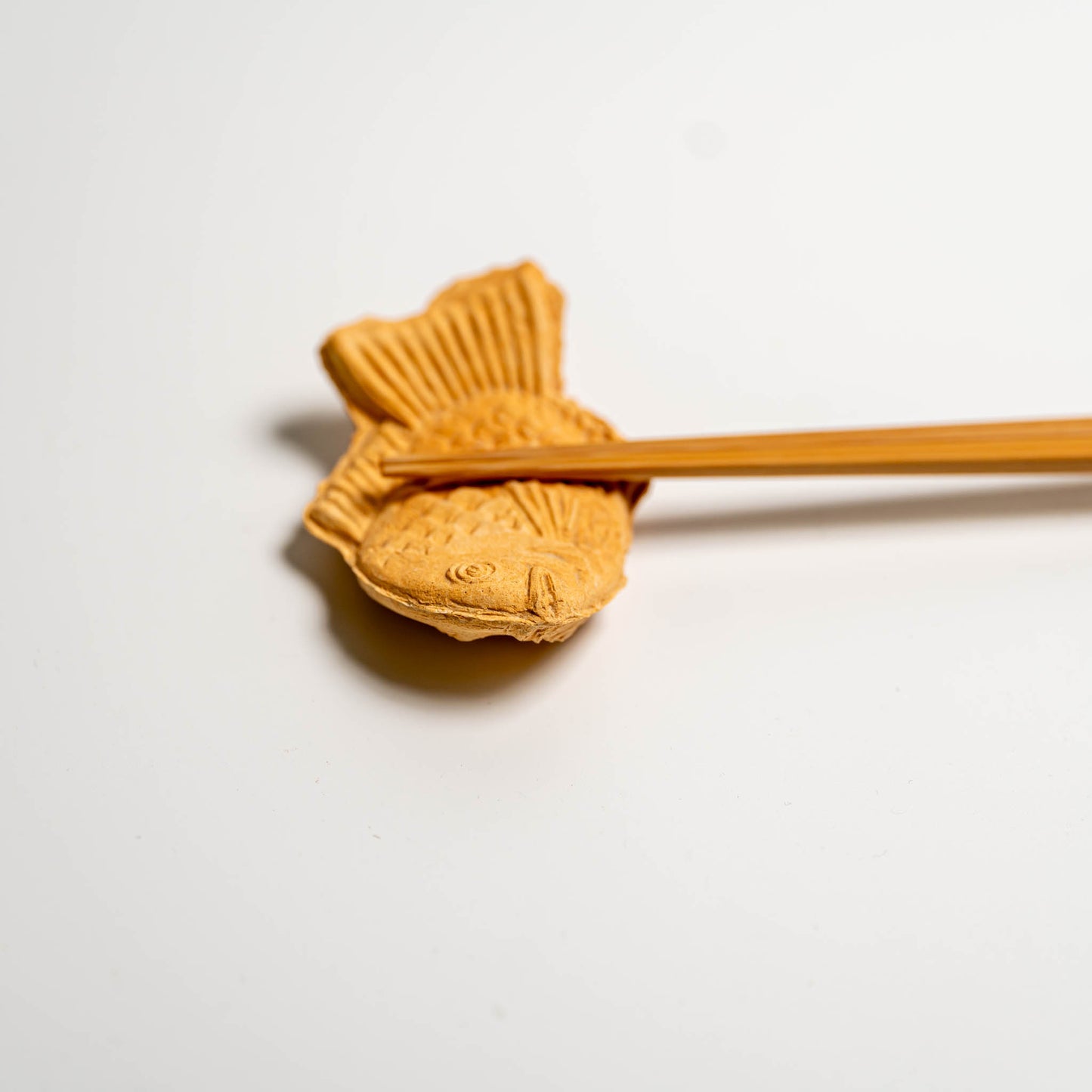 Ceramic chopstick rest with Japanese chopsticks