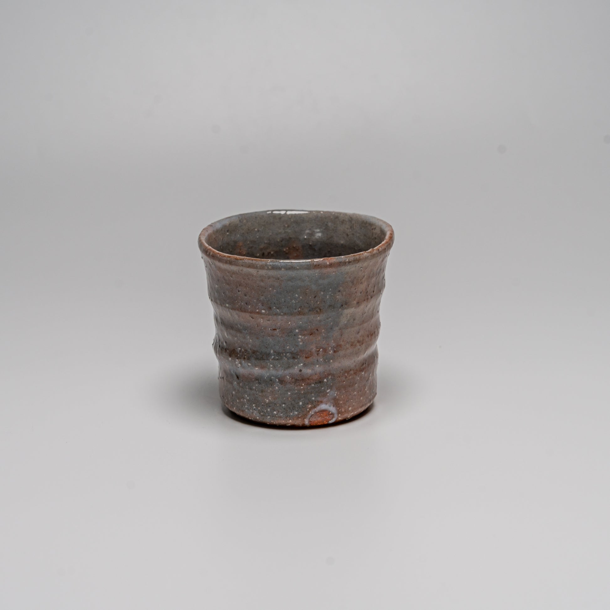 Hagi yaki cup photographed on white