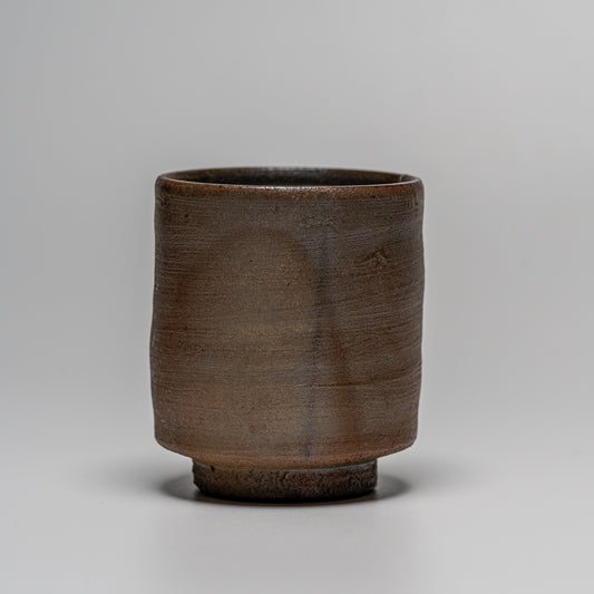 Yakishime cup photographed on white
