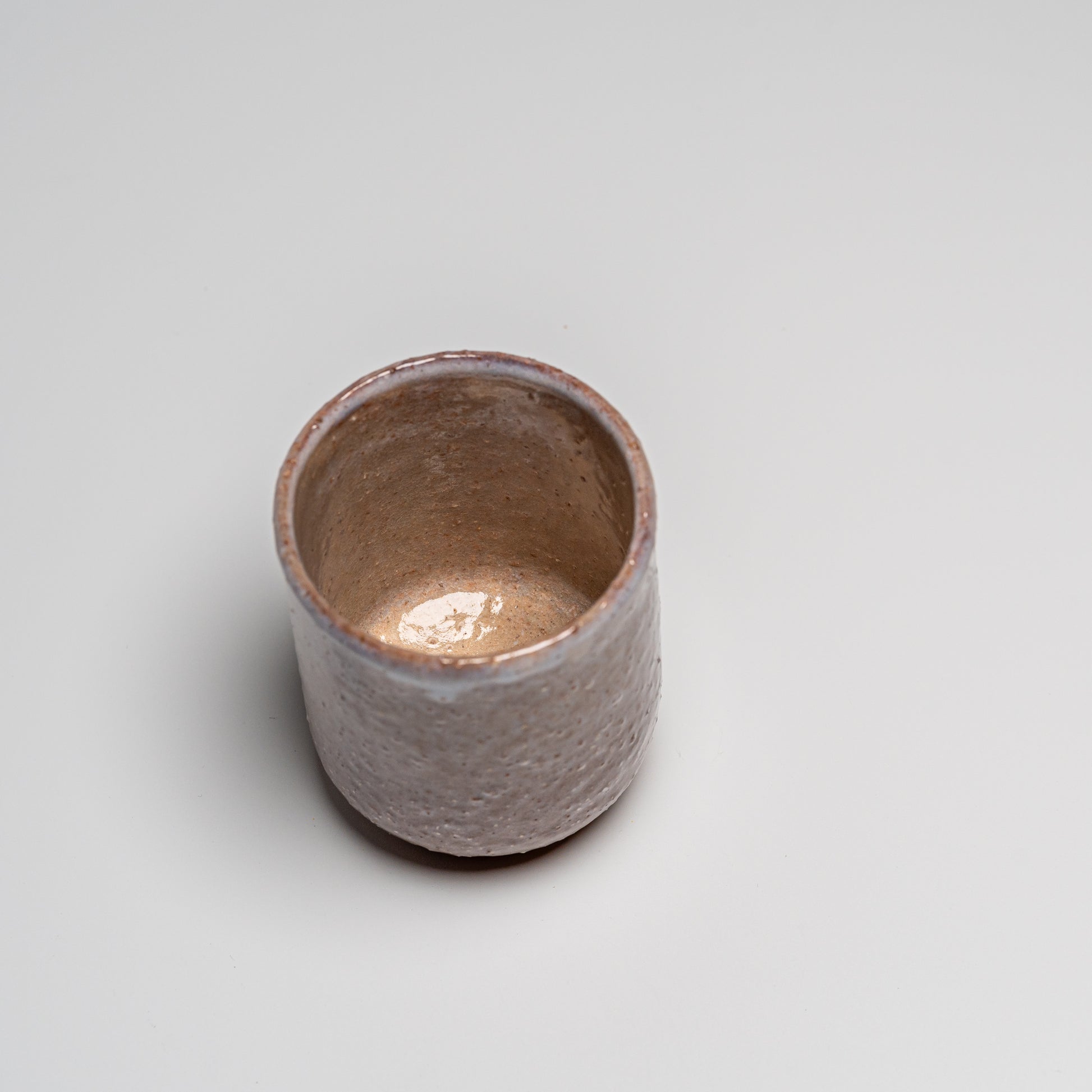 Hagi yaki cup photographed on white