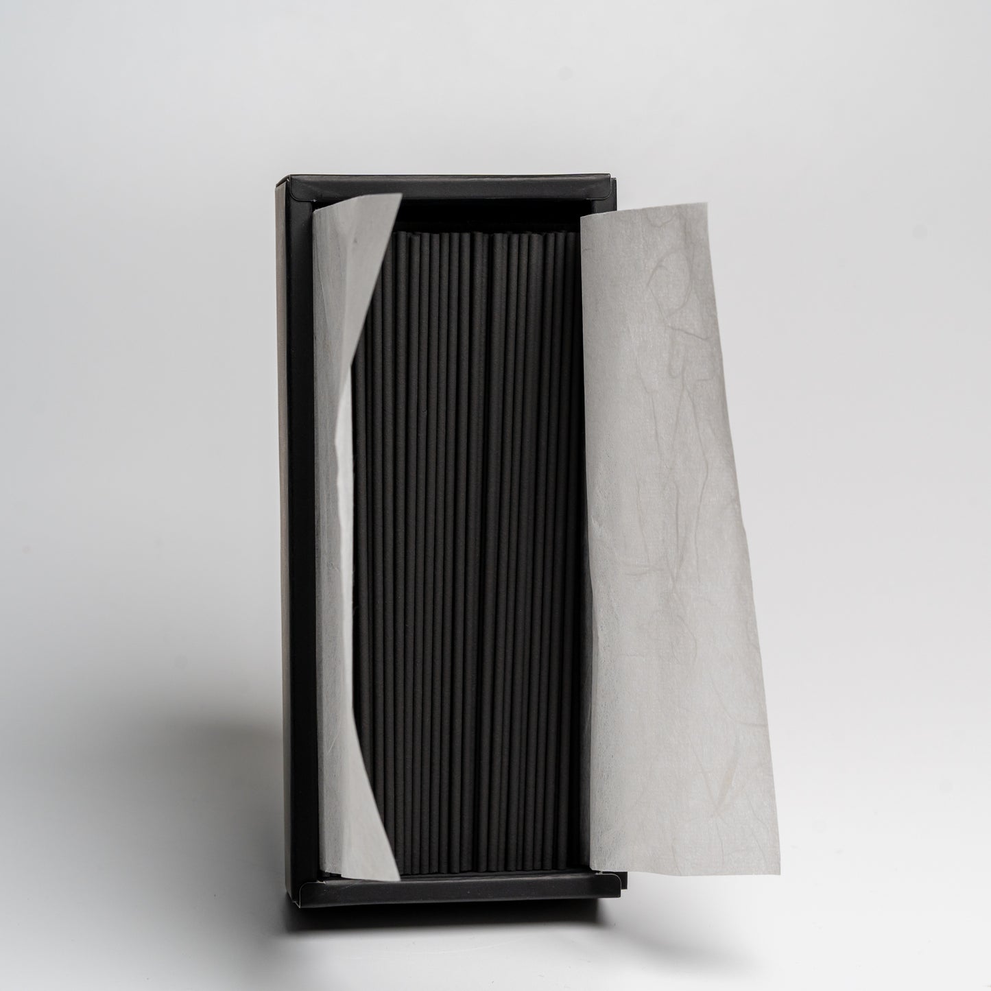 An open box of Bamboo Japanese incense on white