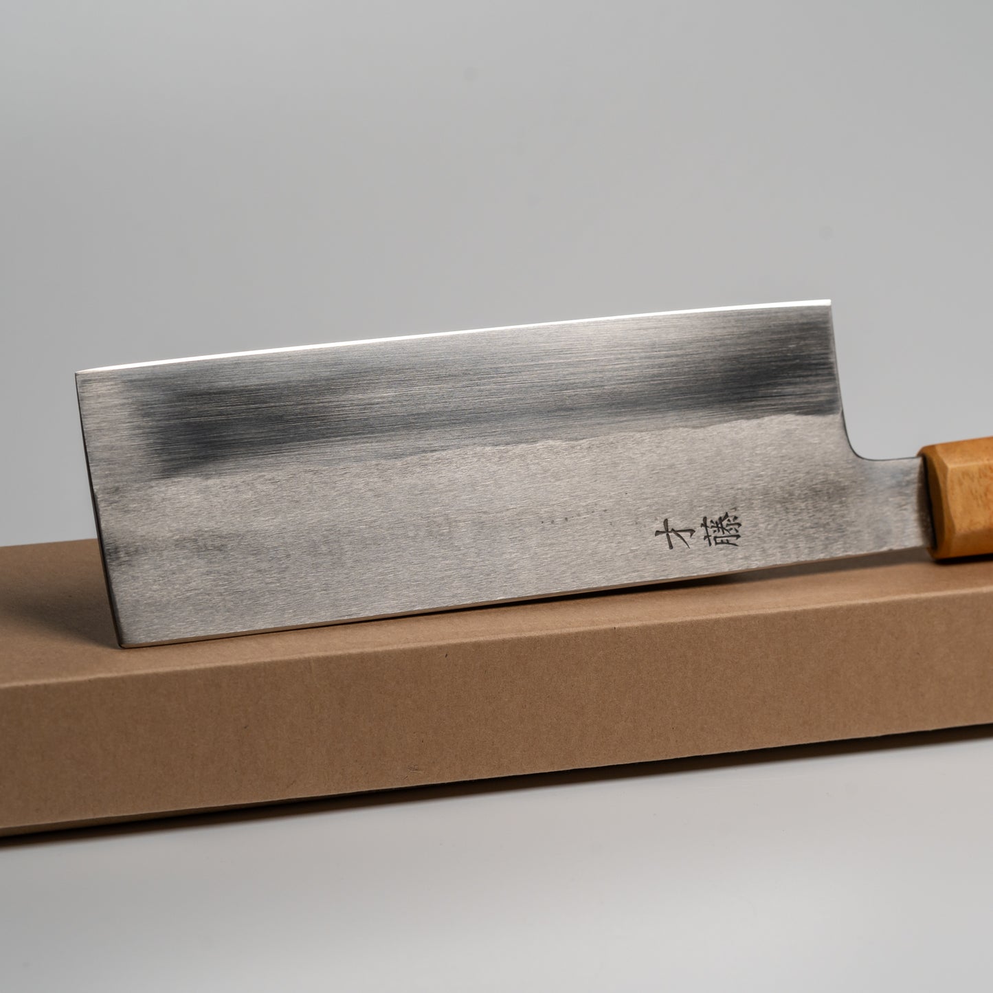 Close up of a Japanese Nakiri knife on its box