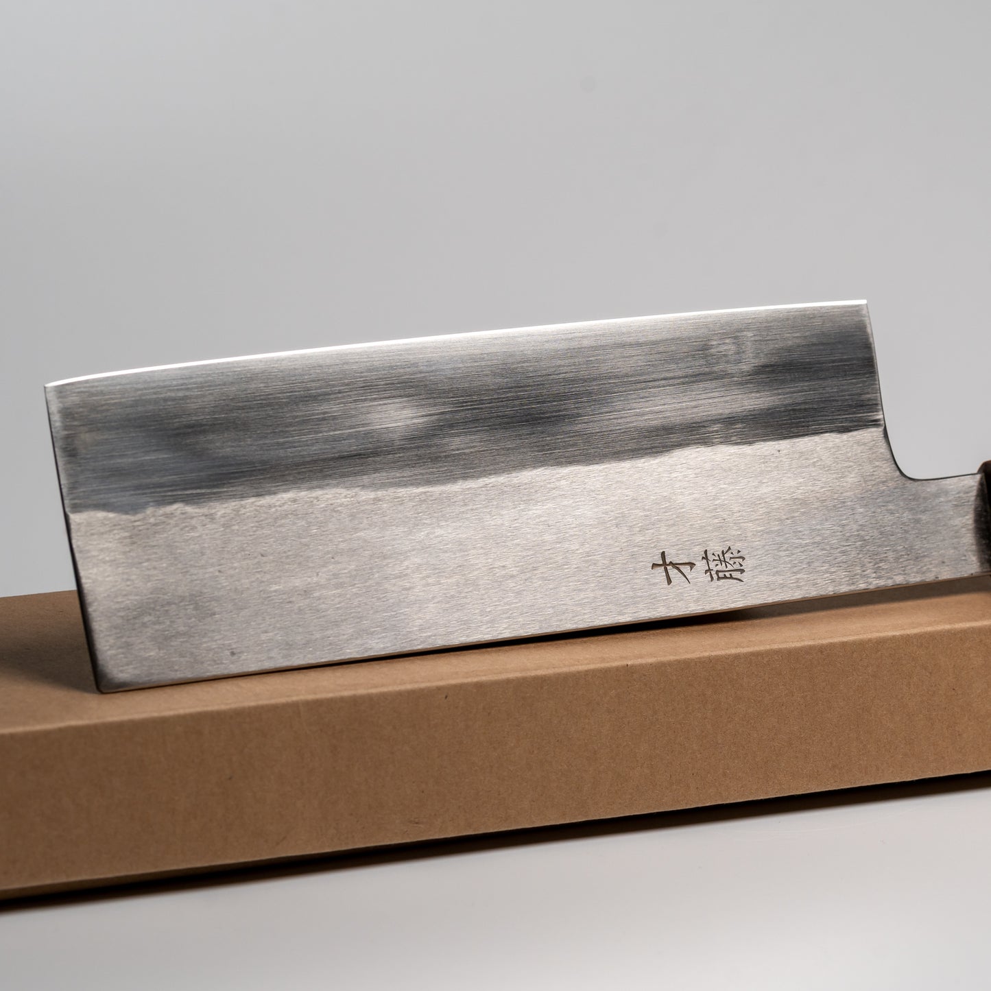 Close up of a Japanese Nakiri knife on its box