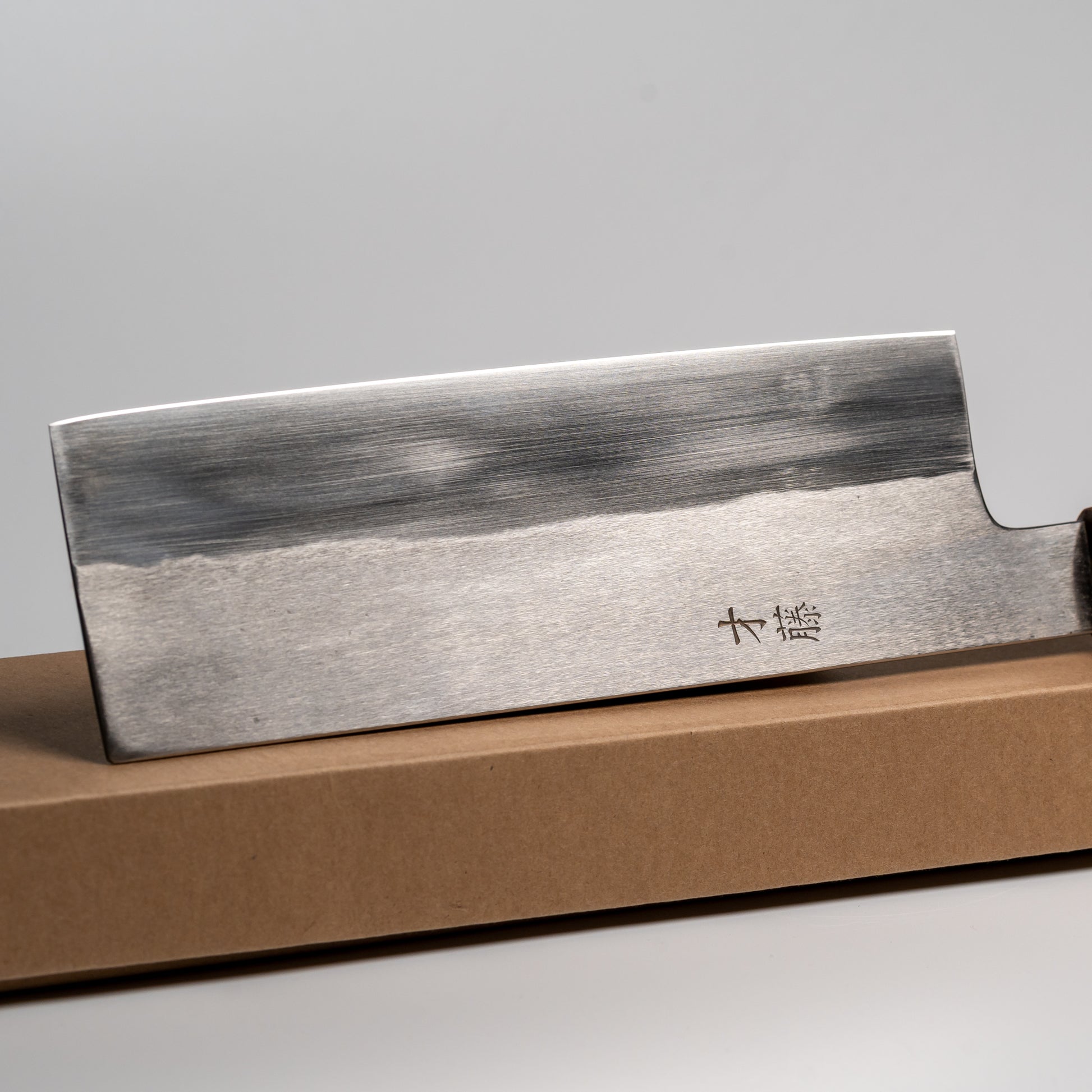 Close up of a Japanese Nakiri knife on its box