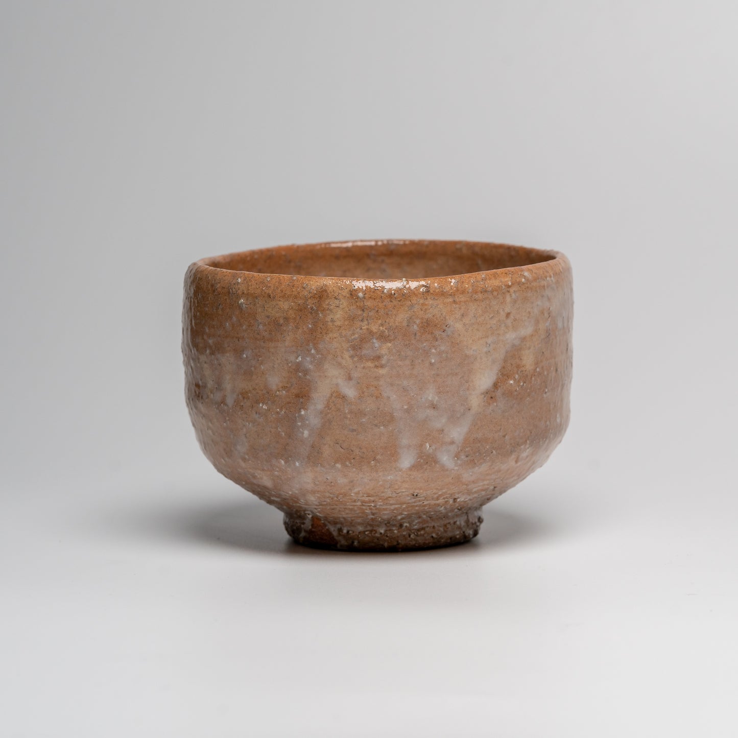 Japanese ceramic matcha tea bowl on white