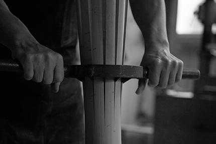 An artist cutting Japanese bamboo