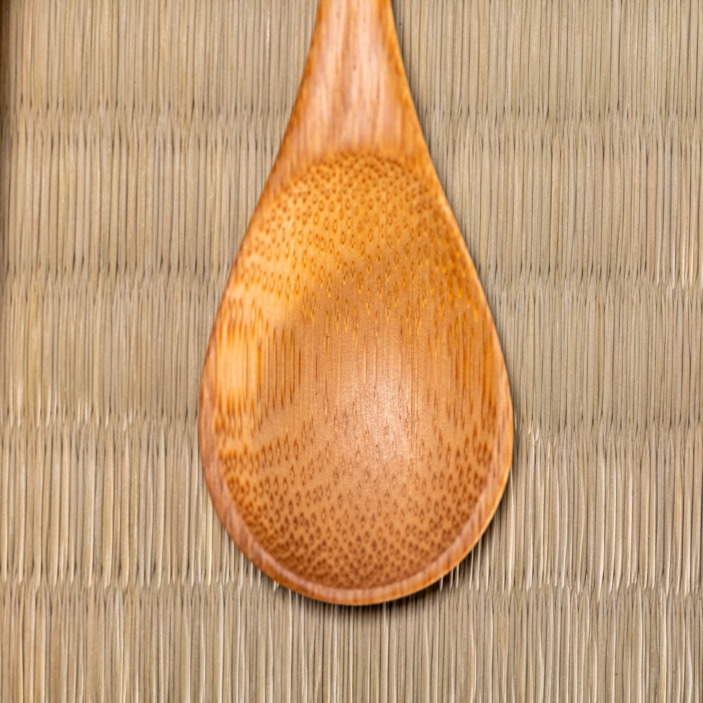 A Japanese bamboo spoon on tatami