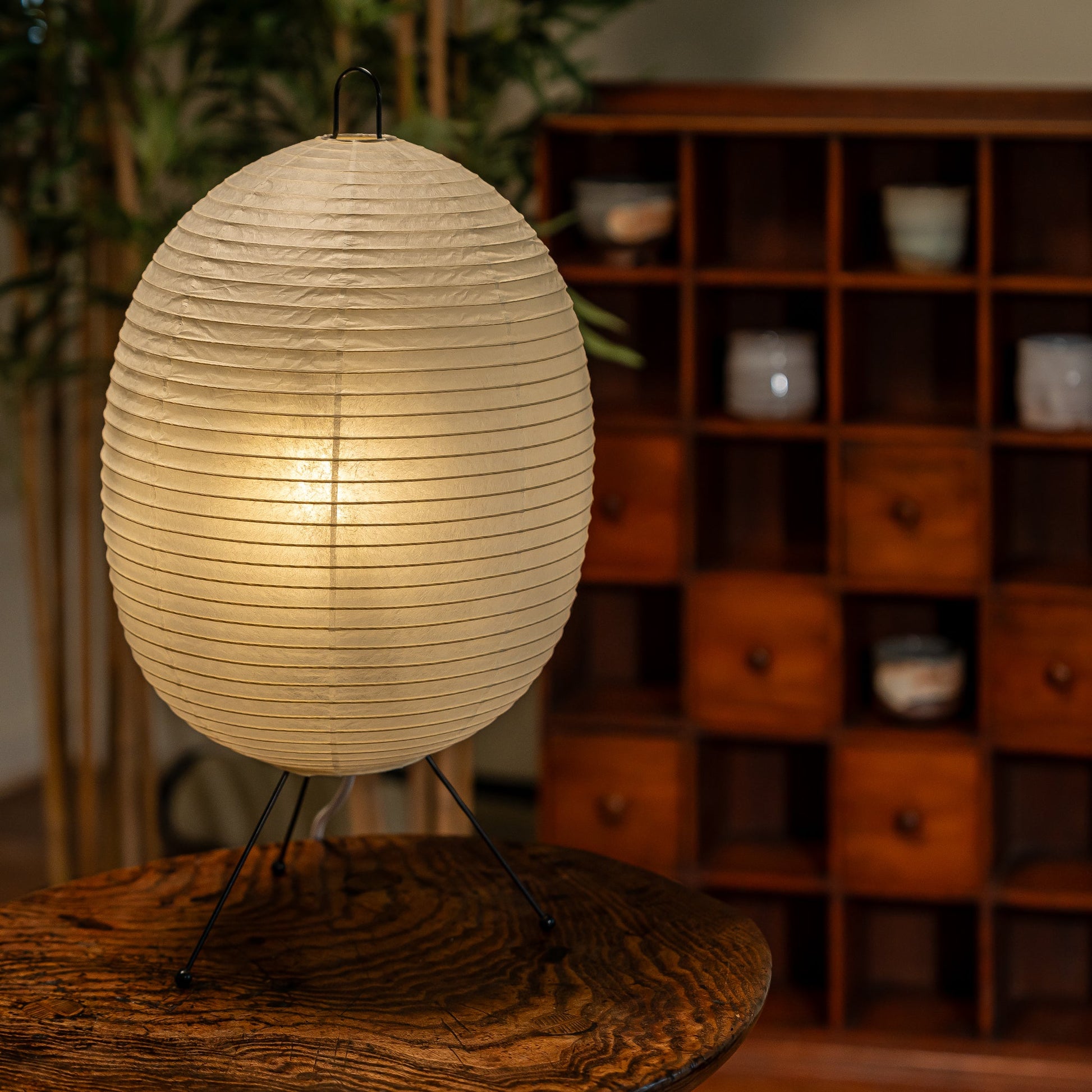 Tawara Chochin paper lamp on a side table