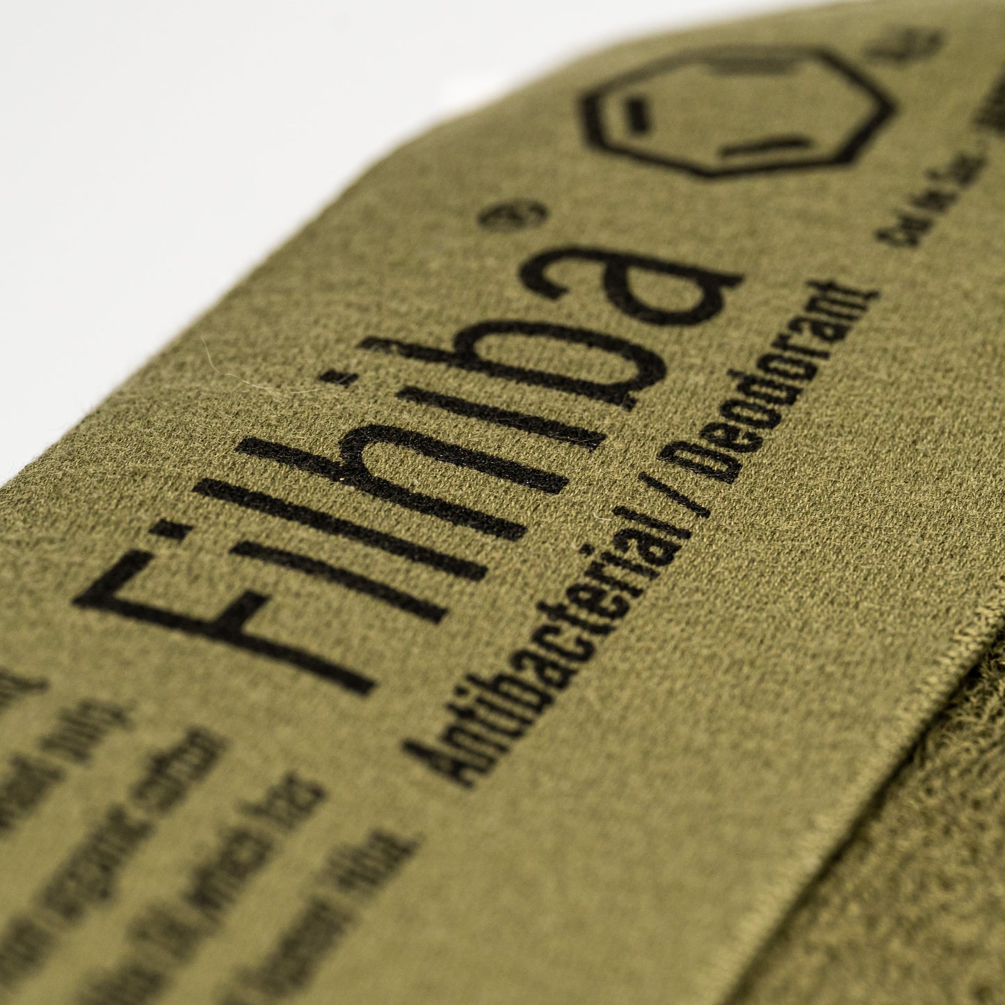 A close up of the green Filhiba towel
