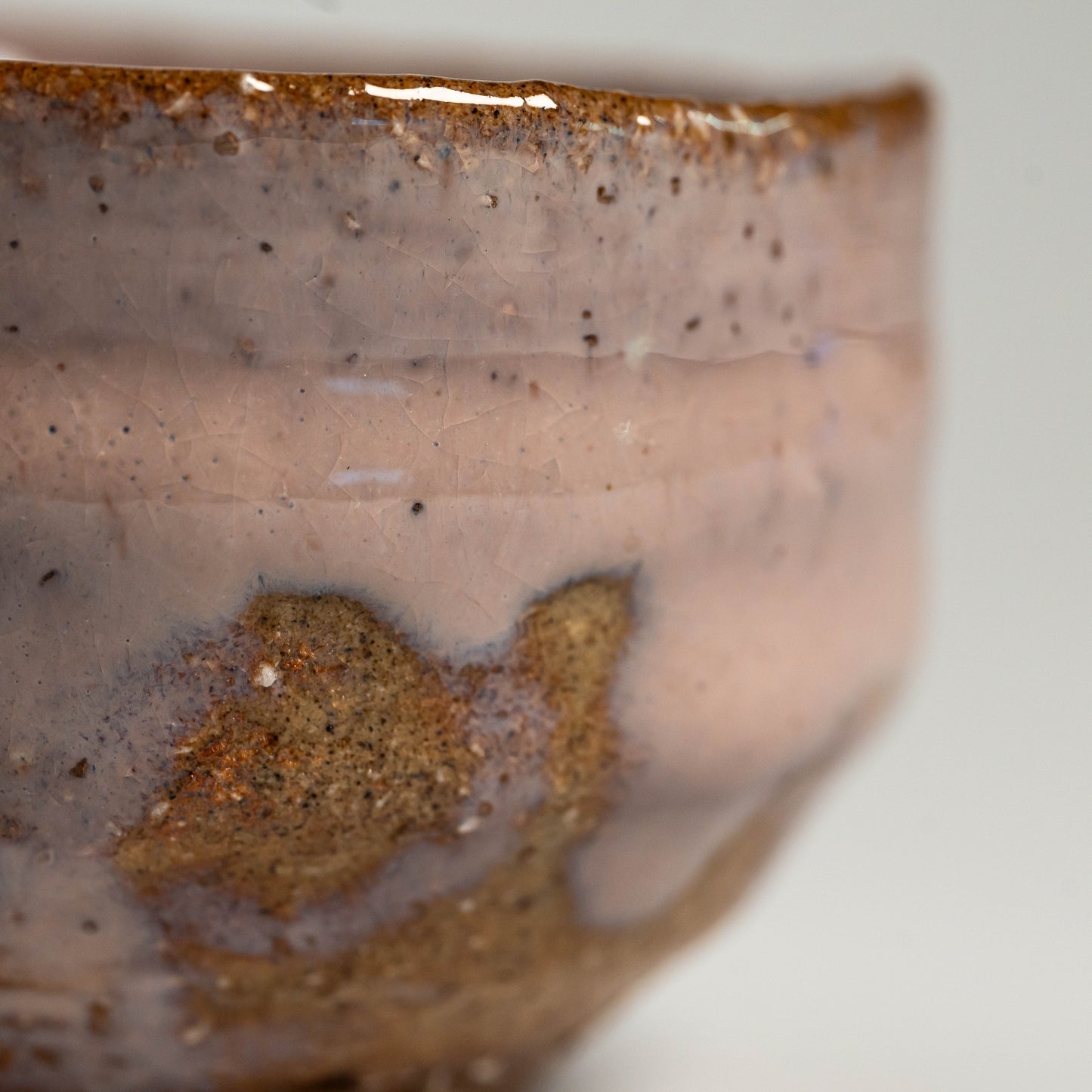 A close up of a pink Hagi yaki sake cup