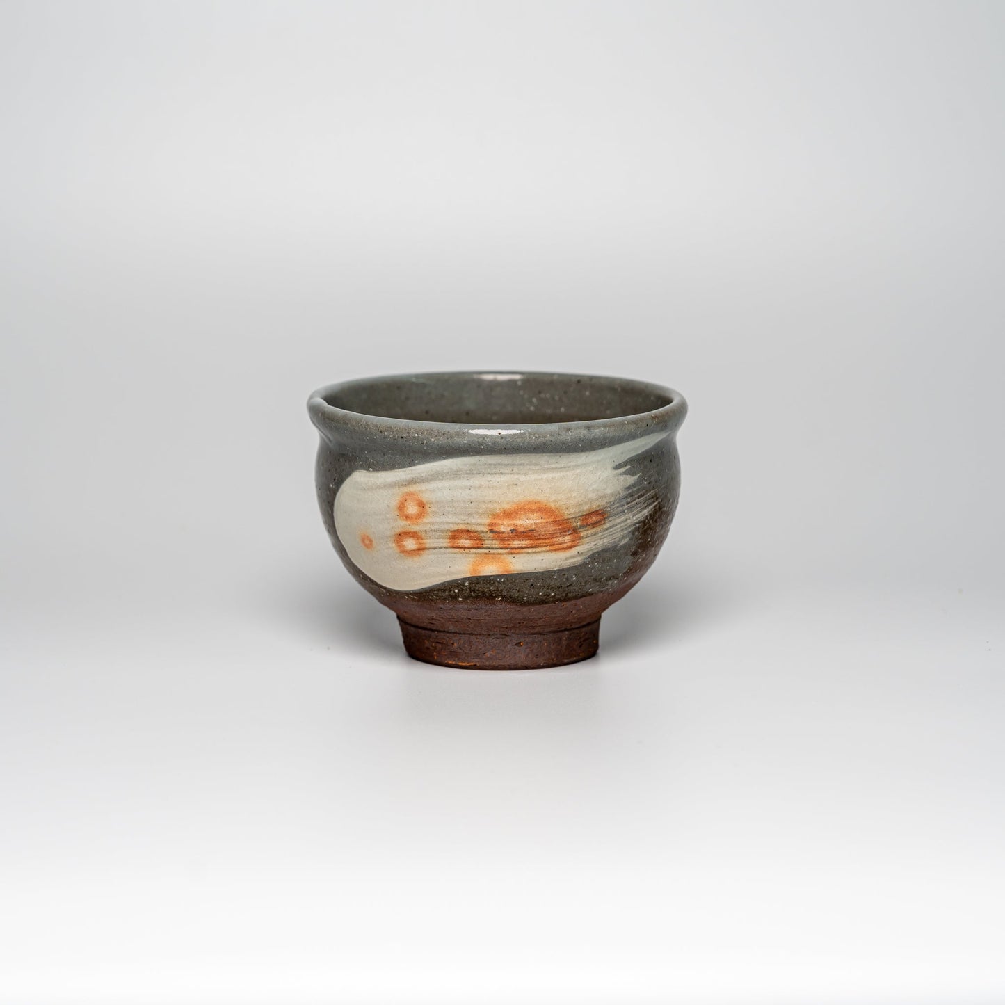 A small Hagi yaki bowl on a white background
