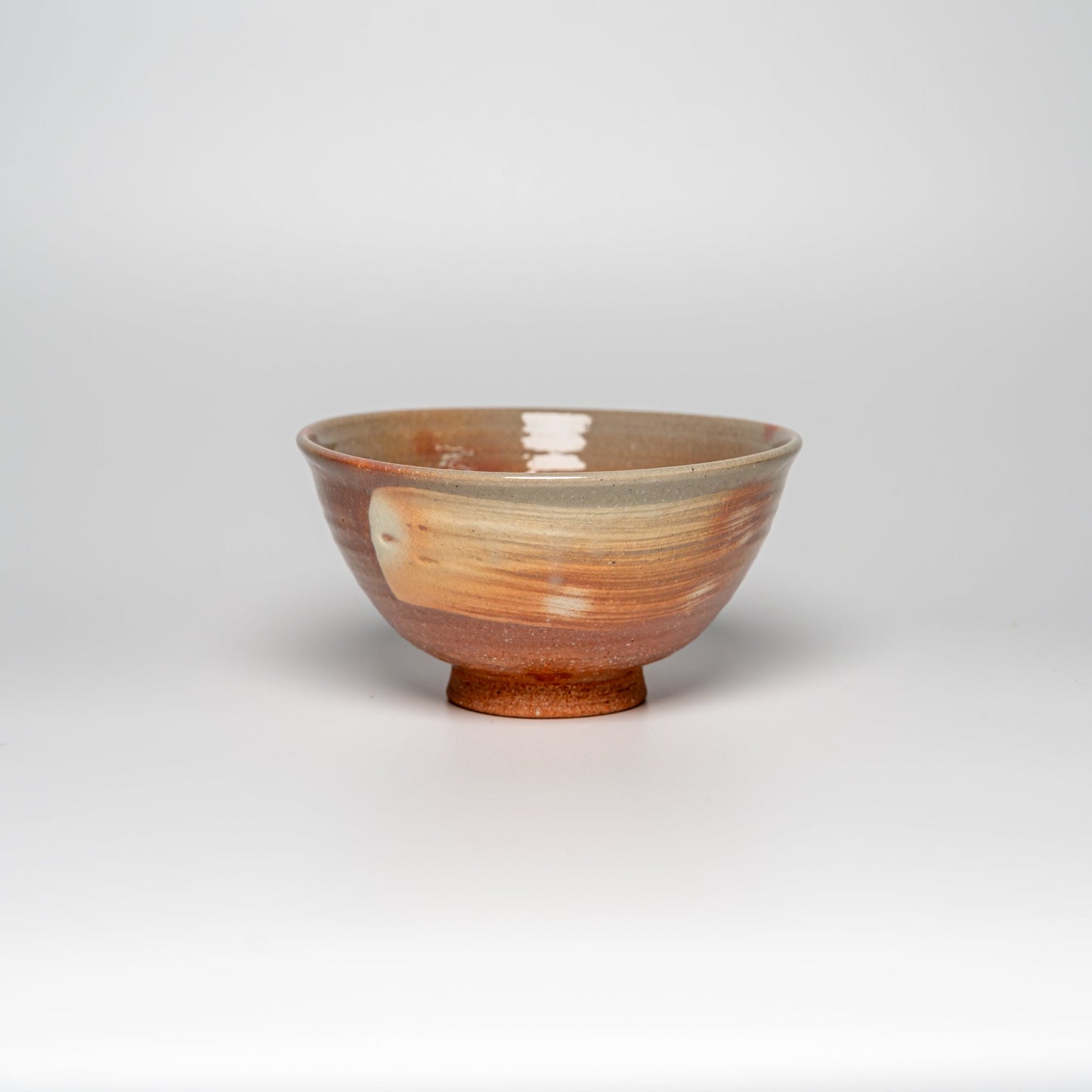 A pink Hagi yaki rice bowl on a white background