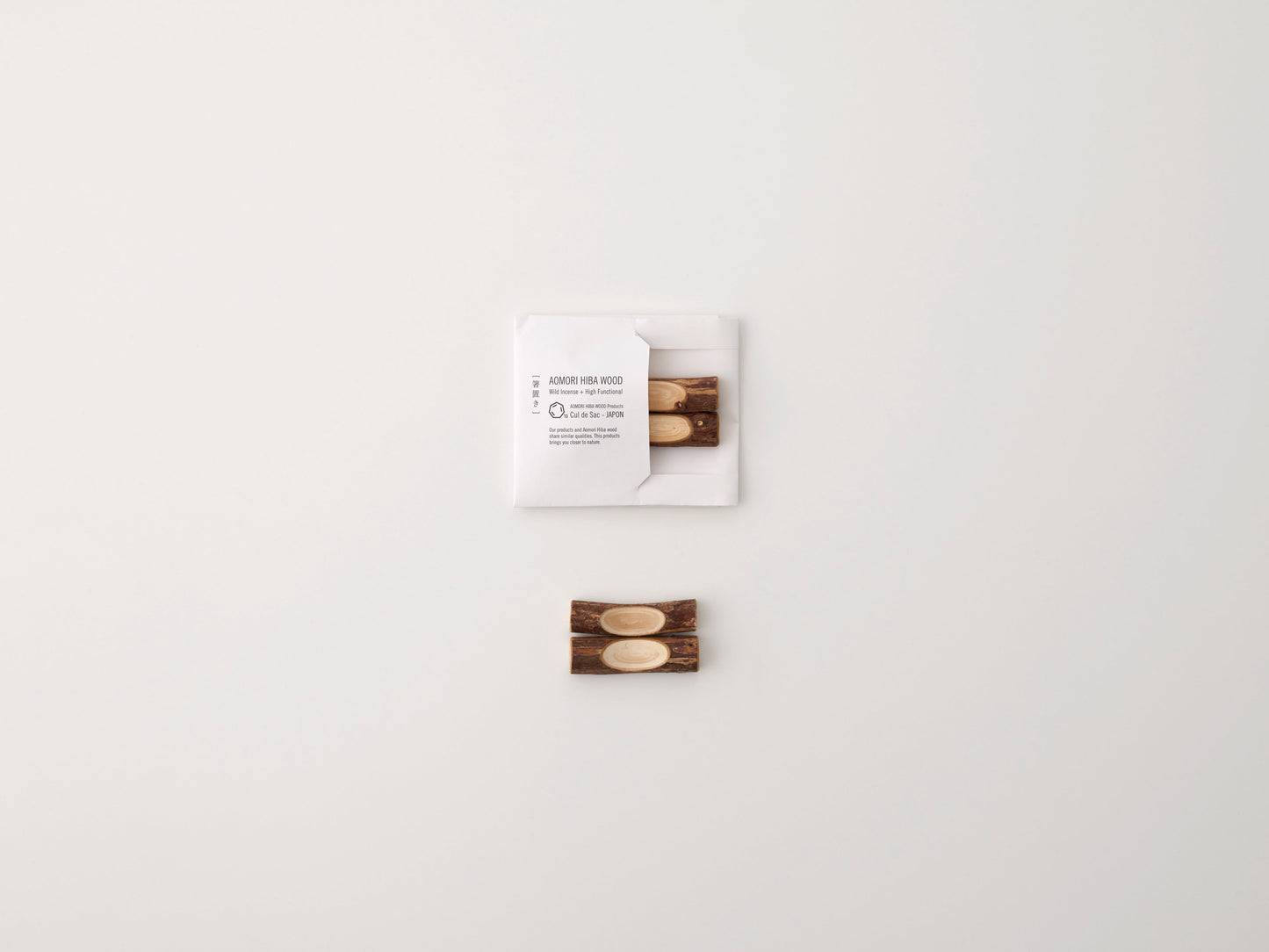 Cul de Sac hiba wood chopstick rests on a white background