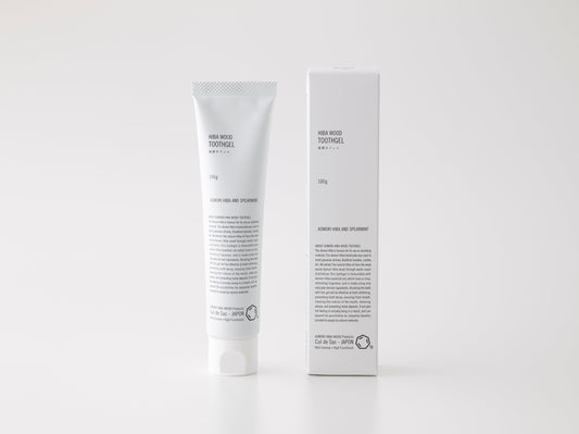 Cul de Sac Hiba toothpaste next to its box on a white background
