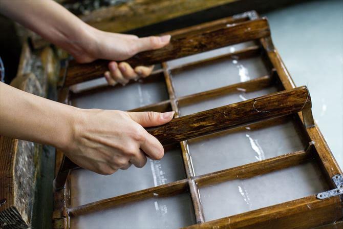 Awagami Factory artisan making washi paper cards