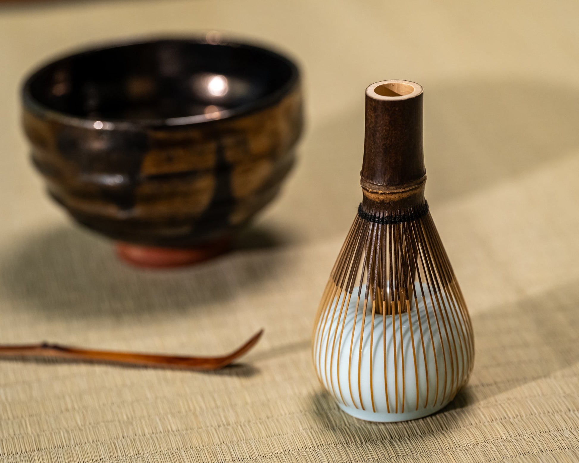 A Japanese tea set on a bamboo tray