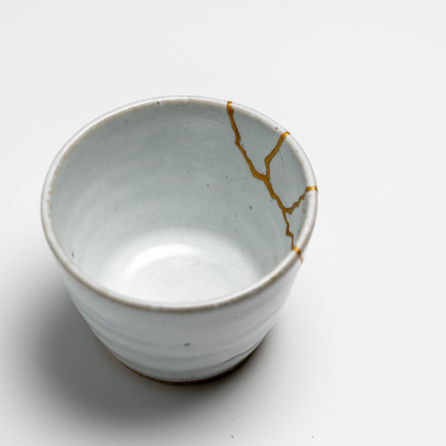 Kintsugi repaired Japanese ceramic cup