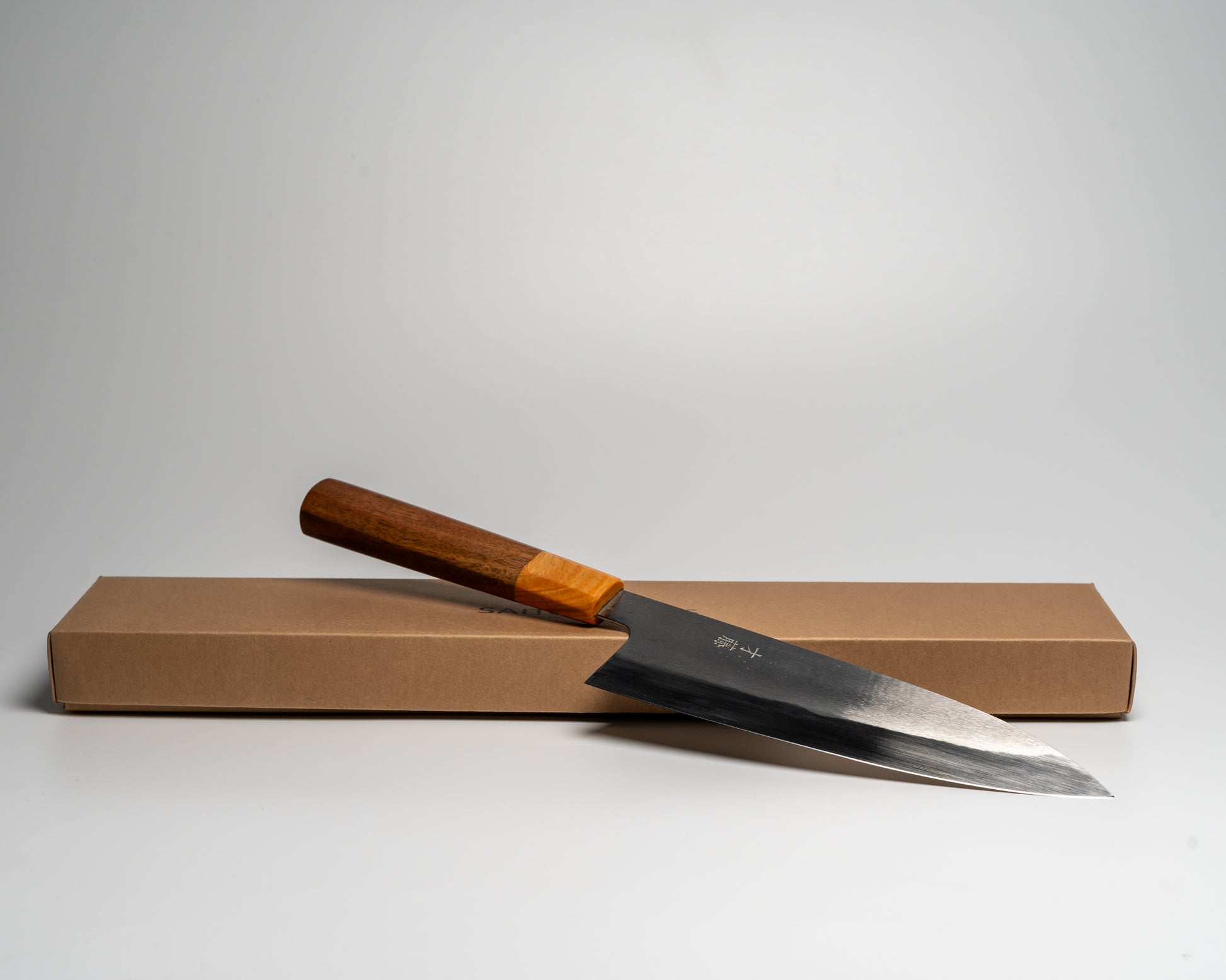 Japanese Gyuto knife on its box