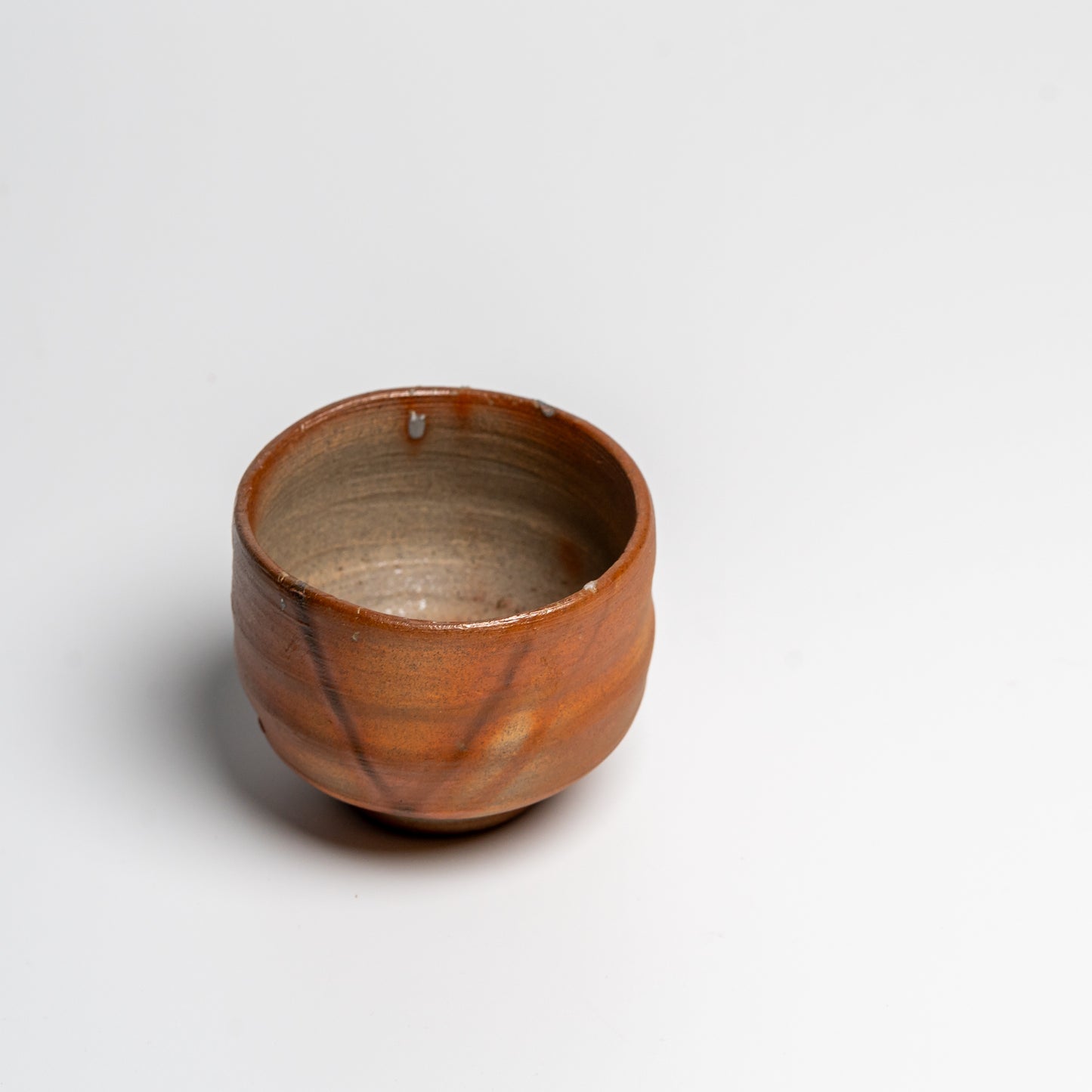 Japanese ceramic sake cup on white