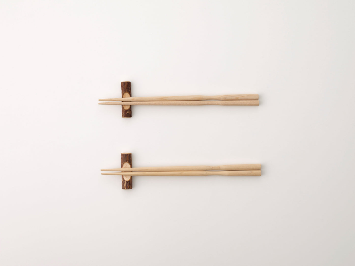 Wooden chopstick rests with chopsticks by Cul de Sac