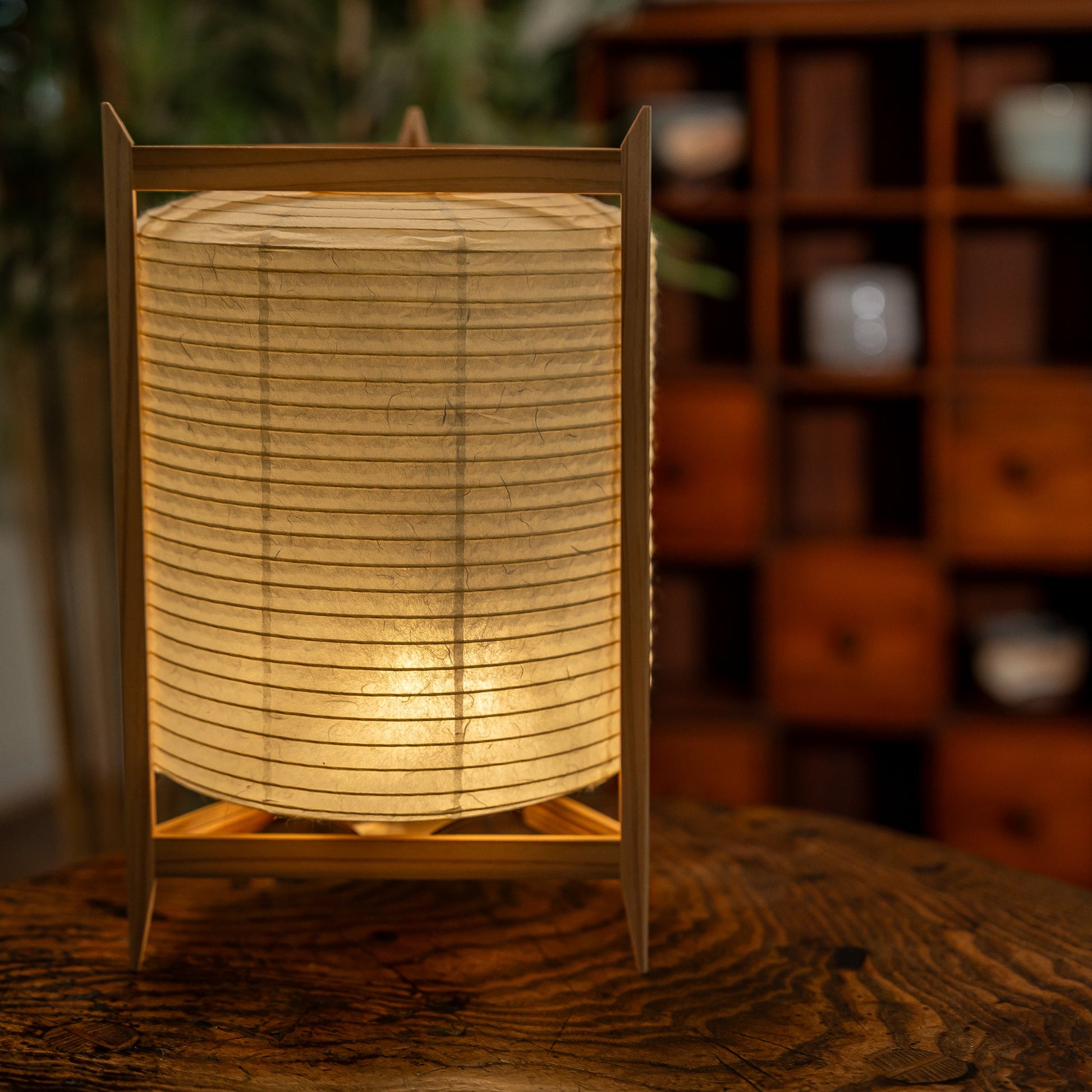 A Japanese washi paper lamp with wooden frame: the Andon Triangle