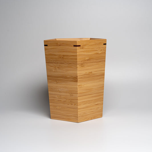 A bamboo wine cooler on a white background