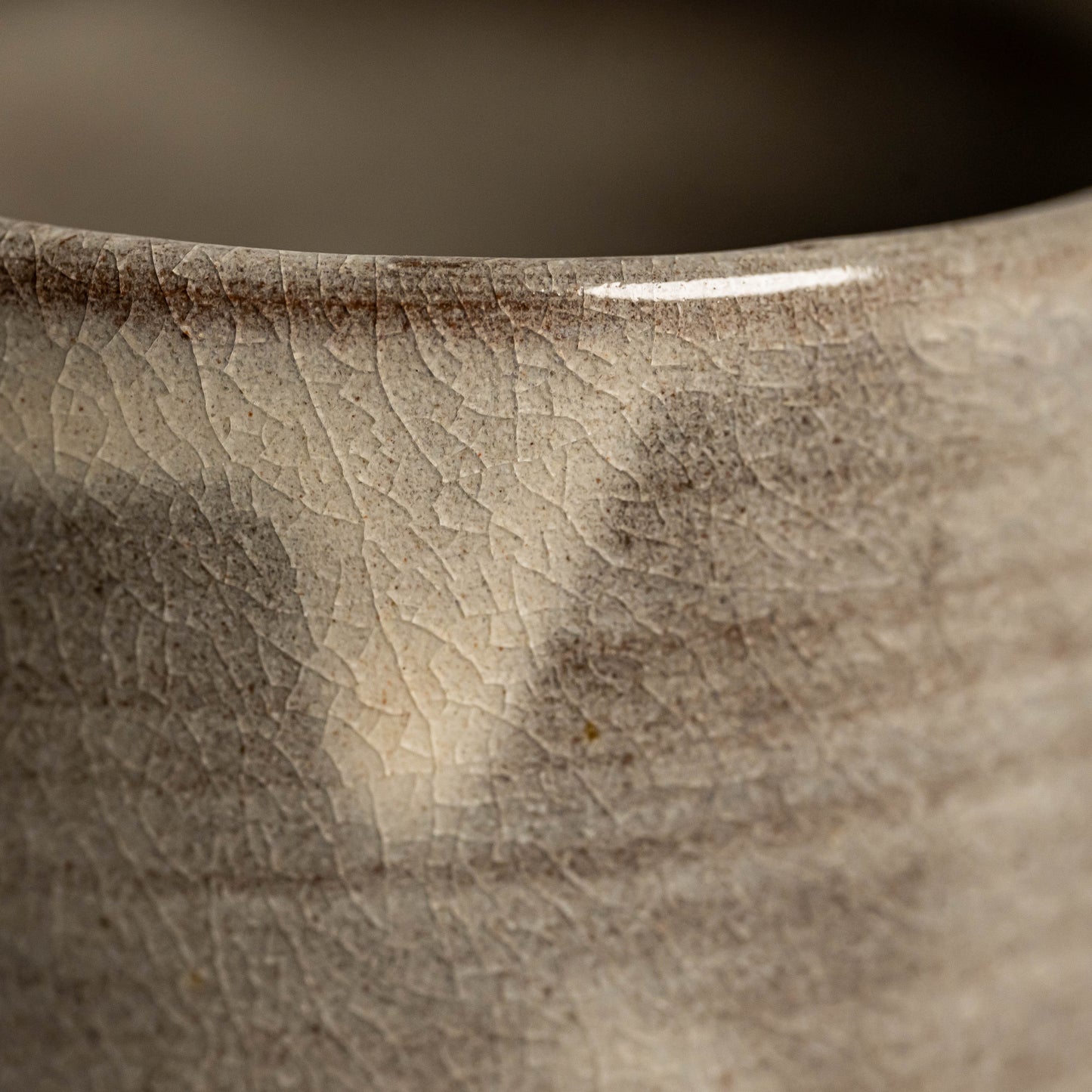 A close up of a brown Hagi yaki teacup 