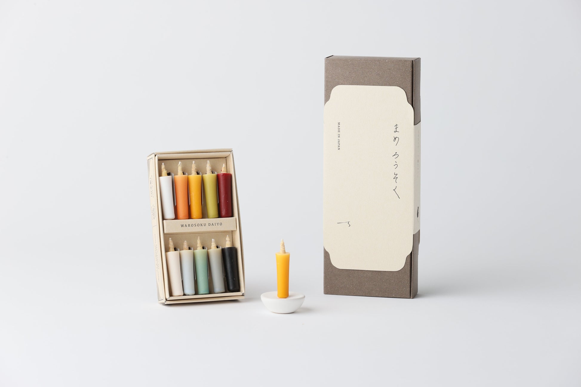 An earth Dyed Rice Wax Candle Set on a white background