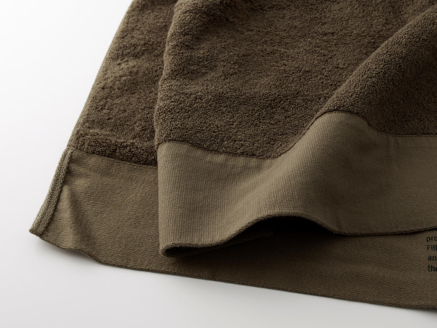 Brown Filhiba towel on a white background