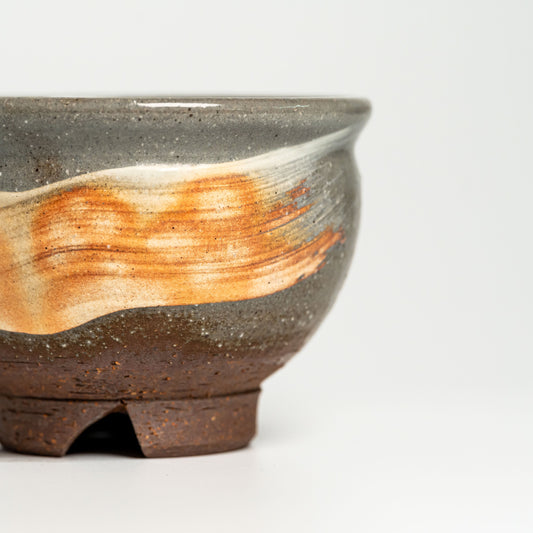 A small Hagi yaki bowl on a white background