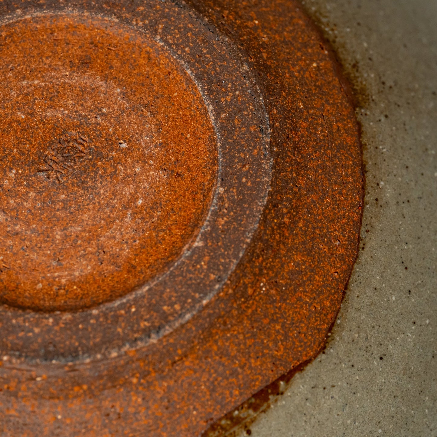 A close up of the bottom of a Hagi yaki ramen bowl