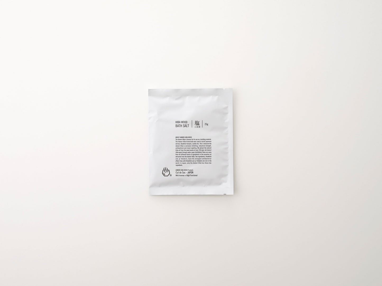 A sachet of Cul de Sac hiba wood bath salts on a white background