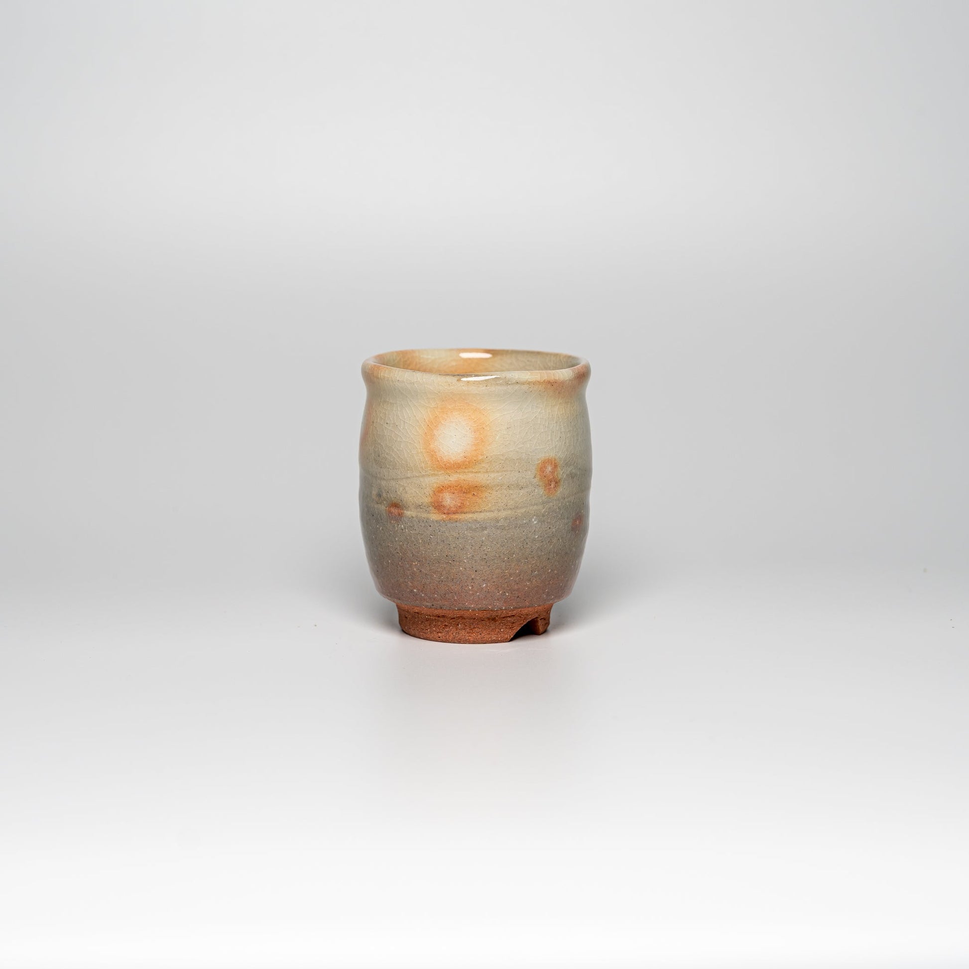 A kesho Hagi yaki teacup on a white background