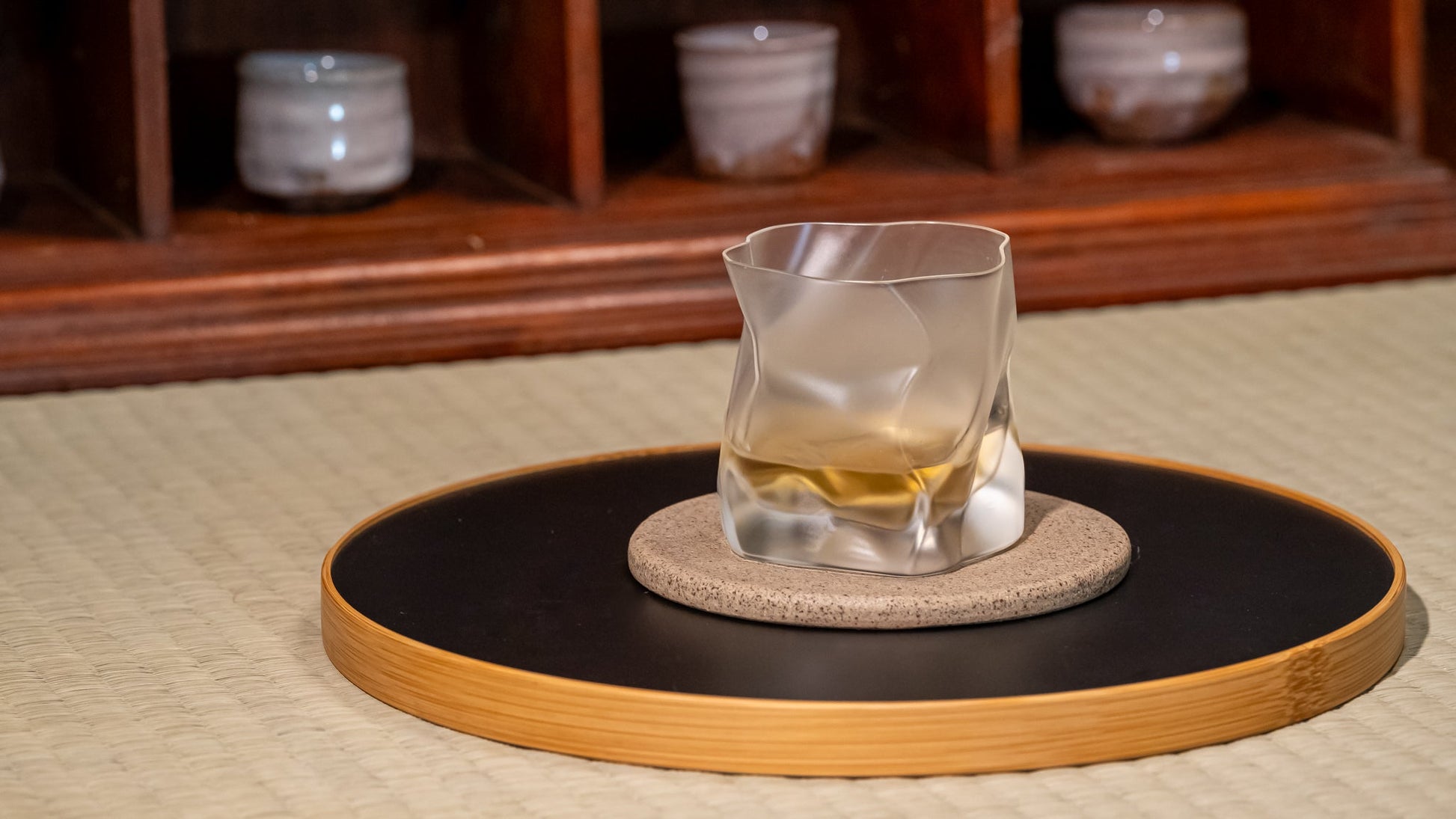 A crumpled whiskey glass by Kimura Glass