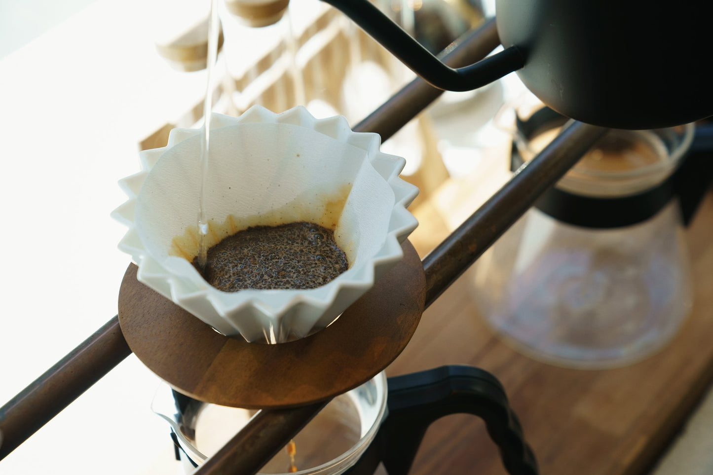 Coffee being made in a White ORIGAMI coffee dripper at a cafe in Japan