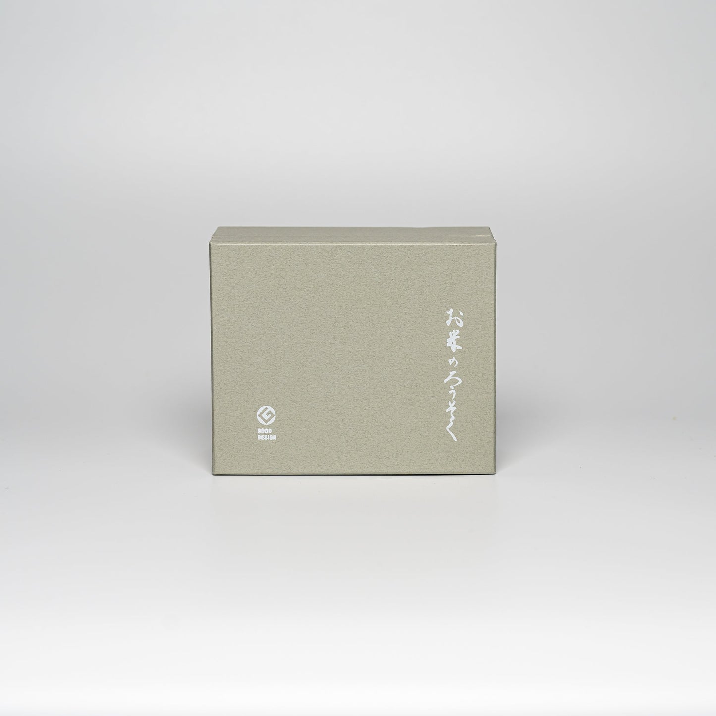 A closed rice wax candle set on a white background