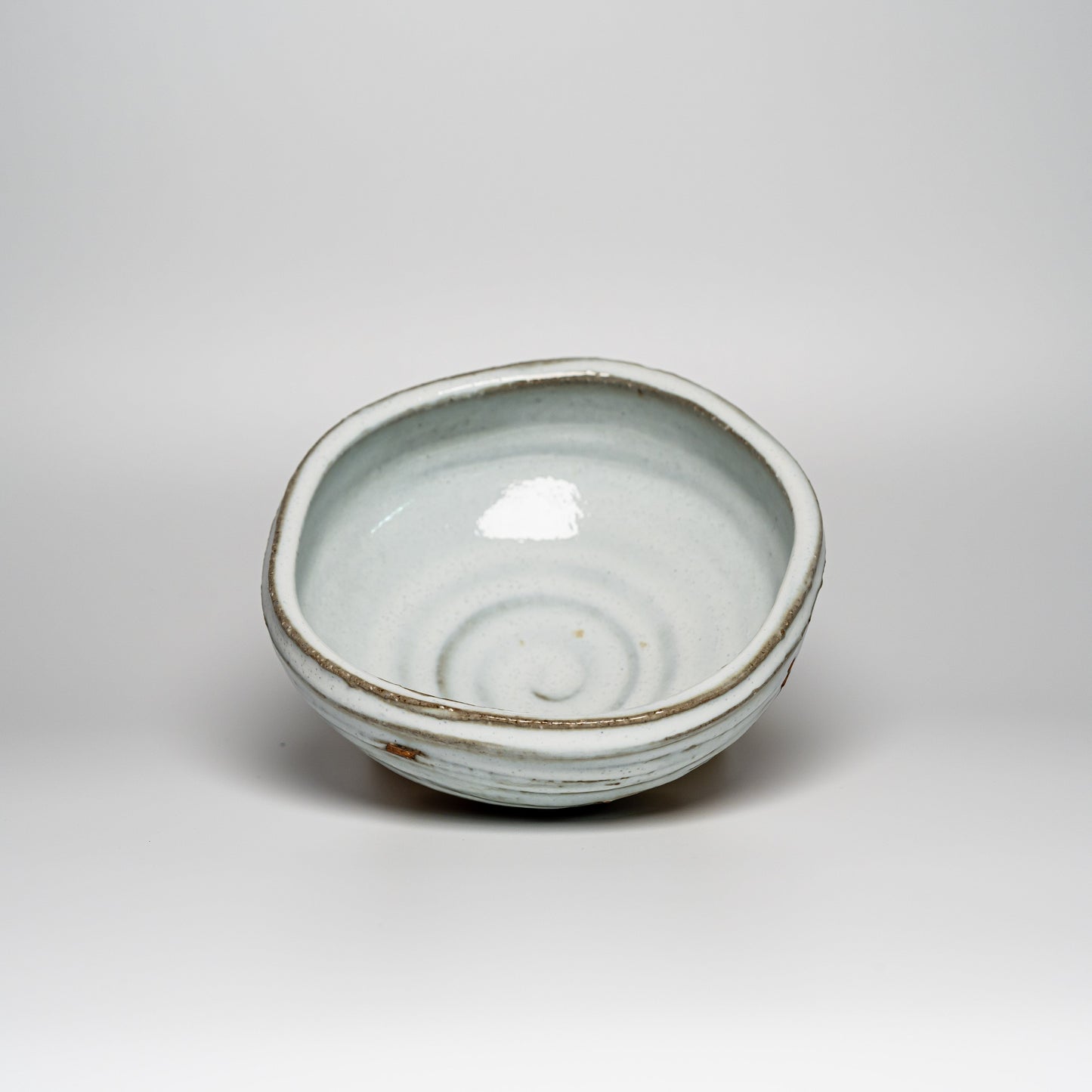 A white Hagi yaki bowl on a white background