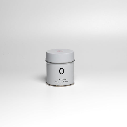 A tin of number 0 blend Japanese matcha from YUGEN Kyoto on a white background